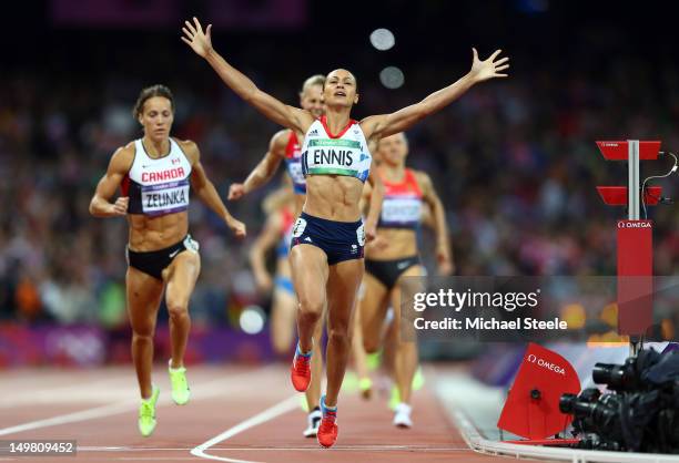 Jessica Ennis of Great Britain crosses the line during the Women's Heptathlon 800m to win overall gold on Day 8 of the London 2012 Olympic Games at...