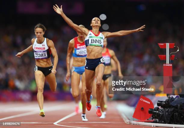 Jessica Ennis of Great Britain crosses the line during the Women's Heptathlon 800m to win overall gold on Day 8 of the London 2012 Olympic Games at...