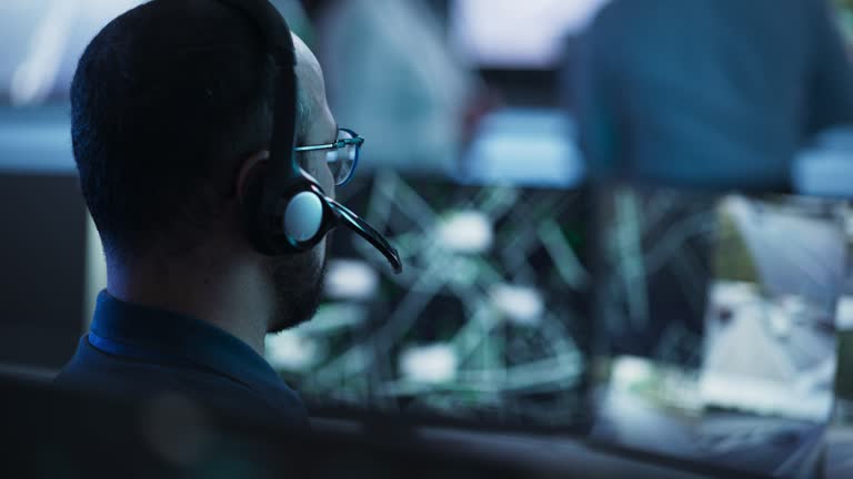 https://media.gettyimages.com/id/1498095718/video/technical-customer-support-specialist-is-talking-on-a-headset-while-working-on-a-computer-in.jpg?b=1&s=640x640&k=20&c=eVRFWZOhXPzW4V0rDUsq_SfEOgr0_UPrkZCOfTW_HG8=