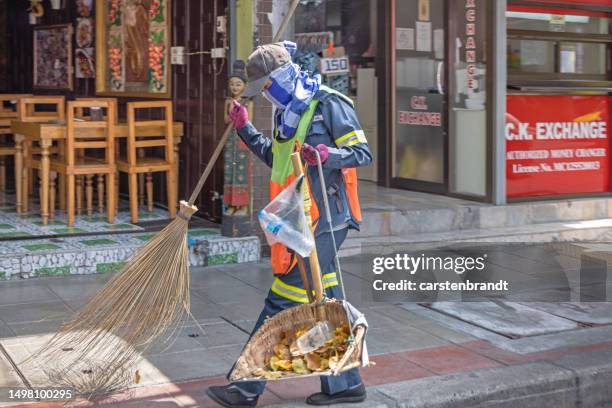 street sweeper working with professional equipment - sidewalk sweeper imagens e fotografias de stock