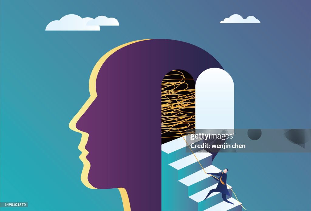 Business man helping brain to clear thoughts