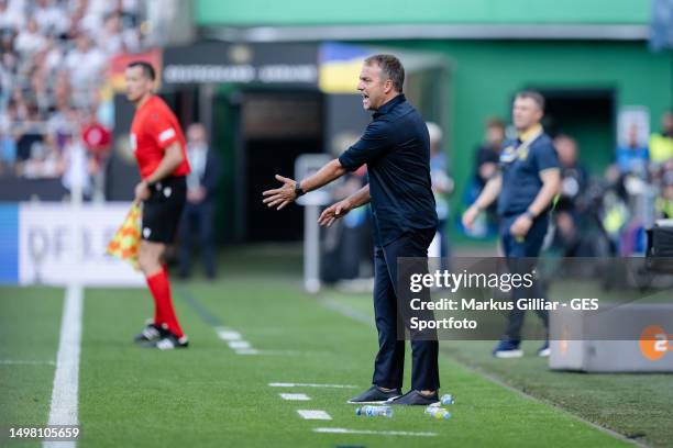 Head Coach Hansi Flick of Germany gives his team instructions during the international friendly between Germany and Ukraine at Wohninvest...