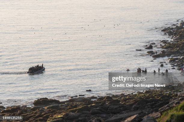 Equihen-Plage, France, : Refugees attempt to flee to the UK aboard an inflatable boat on June 10, 2023 in Equihen-Plage, France.