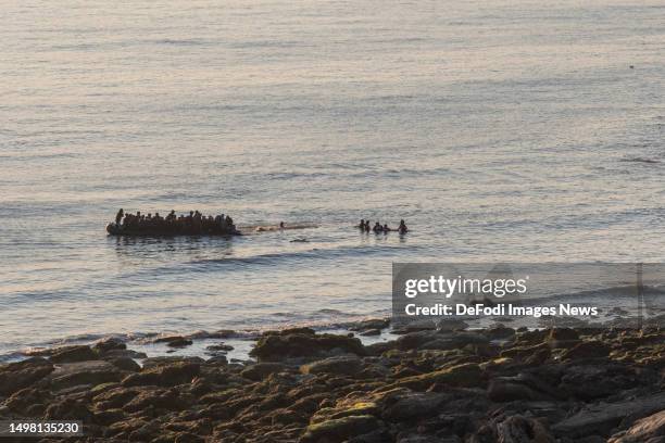 Equihen-Plage, France, : Refugees attempt to flee to the UK aboard an inflatable boat on June 10, 2023 in Equihen-Plage, France.