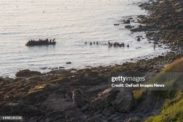 Equihen-Plage, France, : Refugees attempt to flee to the UK aboard an inflatable boat on June 10, 2023 in Equihen-Plage, France.