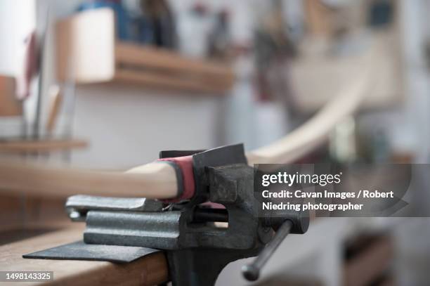 close-up of bow fastening with clamp, bavaria, germany - schraubstock stock-fotos und bilder