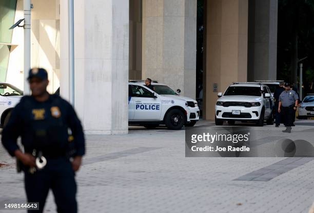 Department of Homeland Security police officers stand near an entrance to the Wilkie D. Ferguson Jr. United States Federal Courthouse before the...