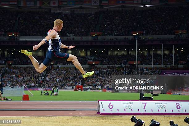 Gold medalist Britain's Greg Rutherford competes in the men's long jump final at the athletics event of the London 2012 Olympic Games on August 4,...