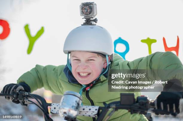 portrait of boy on quad bike - go pro camera imagens e fotografias de stock