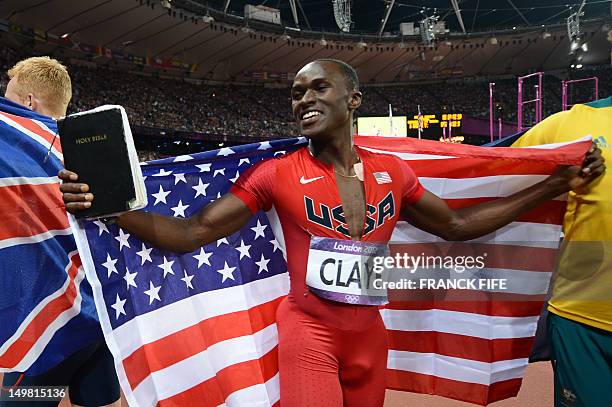 Silver medalist US' Will Claye celebrates after the men's long jump at the athletics event of the London 2012 Olympic Games on August 4, 2012 in...