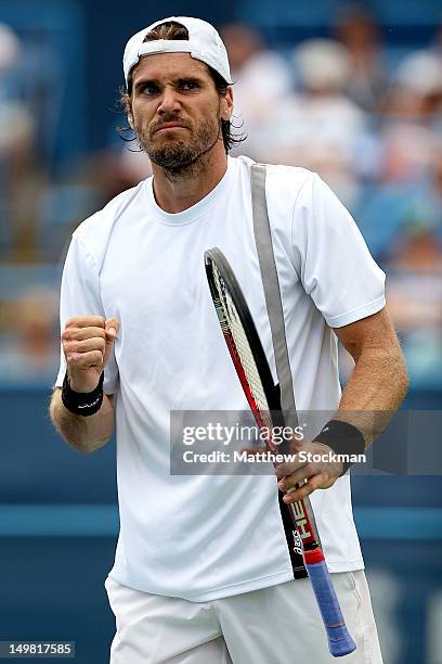 Tommy Haas of Germany celebrates match point against Mardy Fish during the semifinals of the Citi Open at William H.G. FitzGerald Tennis Center on...