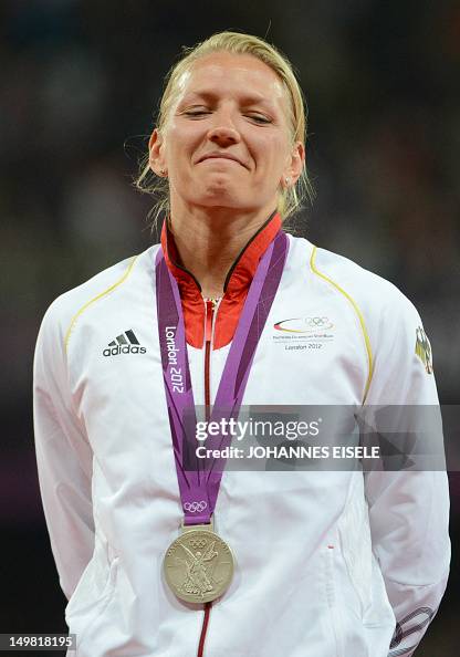 Silver medalist Germany's Lilli Schwarzkopf poseS on the podium of ...
