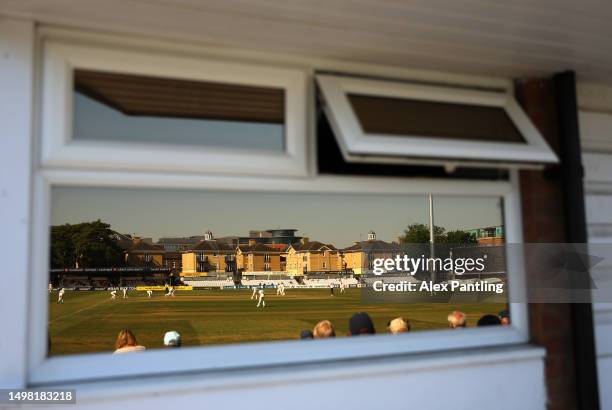 View of action reflecting through a window during the LV= Insurance County Championship Division 1 match between Essex and Somerset at Cloud County...