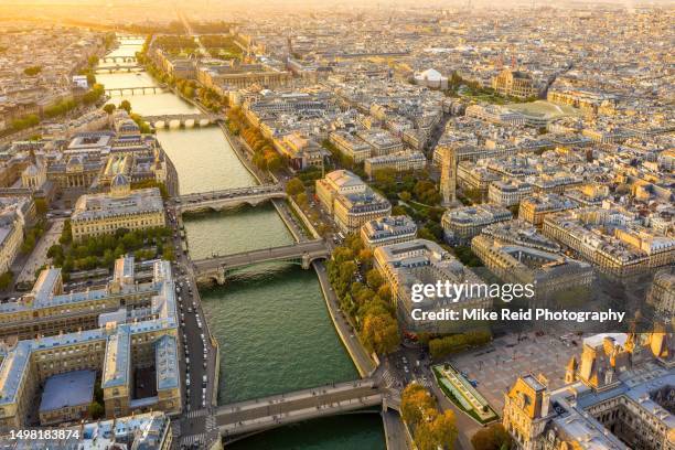 aerial paris seine river and bridges sunset light - place charles de gaulle stock pictures, royalty-free photos & images