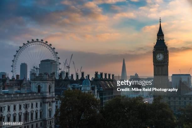london sunrise big ben and the millennium wheel - big ben stock pictures, royalty-free photos & images