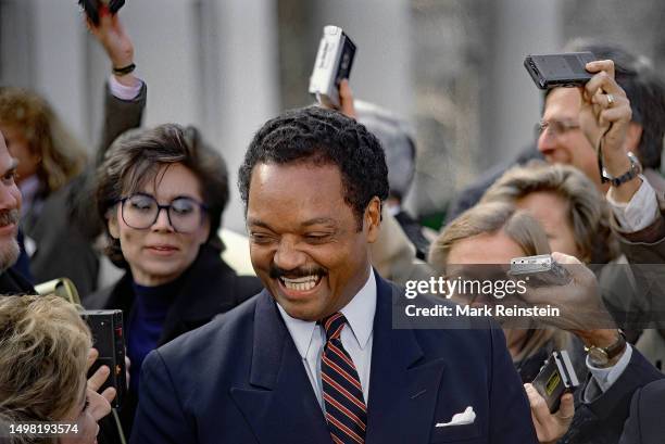 The Reverend Jesse Jackson laughs at a question asked by Andrea Mitchell of NBC during a news conference outside the White House in the West Wing...