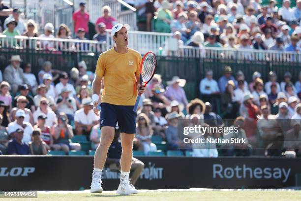 Andy Murray of Great Britain reacts in the Men's Singles Round of 32 match against Joris De Loore of Belgium during Day Two of the Rothesay Open...