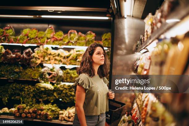 young woman shopping for groceries in produce store,belo horizonte,state of minas gerais,brazil - latin america people stock pictures, royalty-free photos & images