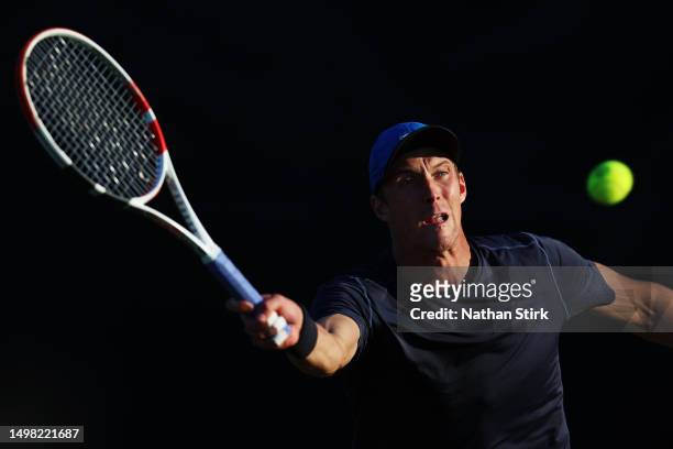 Jan Choinski of Great Britain stretches to play a forehand in the Men's Singles Round of 32 match against Hugo Grenier of France during Day Two of...