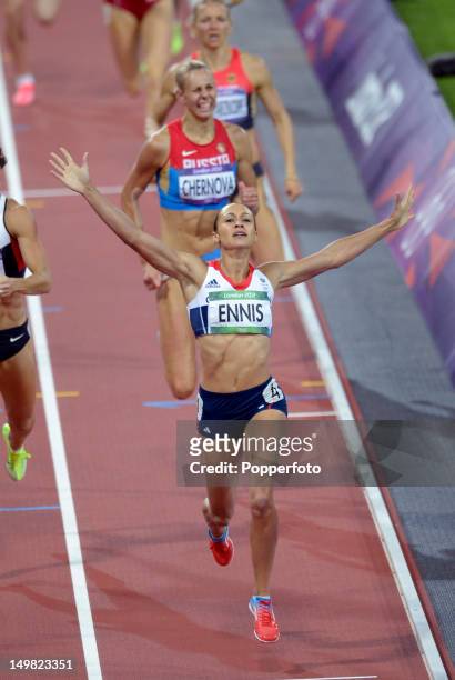 Jessica Ennis of Great Britain celebrates winning gold in the Women's Heptathlon on Day 8 of the London 2012 Olympic Games at Olympic Stadium on...
