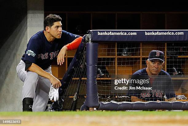 Jacoby Ellsbury and manager Bobby Valentine of the Boston Red Sox look on against the New York Yankees at Yankee Stadium on July 27, 2012 in the...