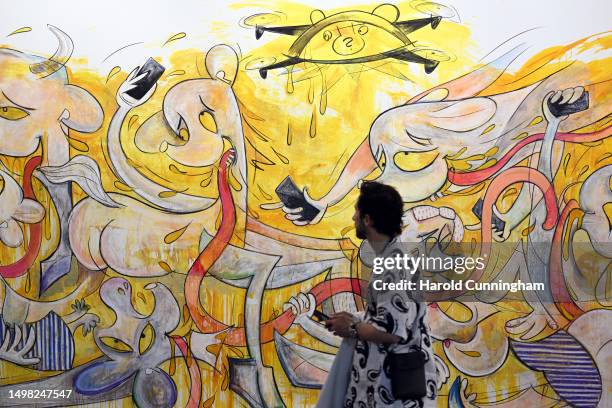 Visitor looks at the artwork of Simon Fujiwara "Who vs Who vs Who?", 2023 on June 13, 2023 in Basel, Switzerland. Art Basel is one of the most...