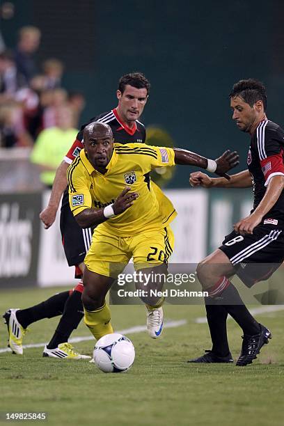 Emilio Renteria of the Columbus Crew controls the ball against Branko Boskovic of D.C. United at RFK Stadium on August 4, 2012 in Washington, DC.