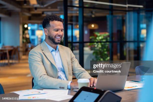 business man working at the office working on a financial data. - effortless experience stock pictures, royalty-free photos & images