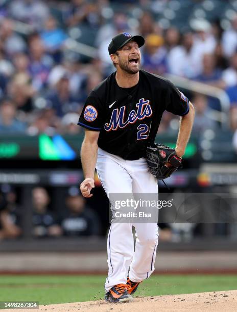 Max Scherzer of the New York Mets reacts after giving up a solo home run to Giancarlo Stanton of the New York Yankees in the first inning at Citi...