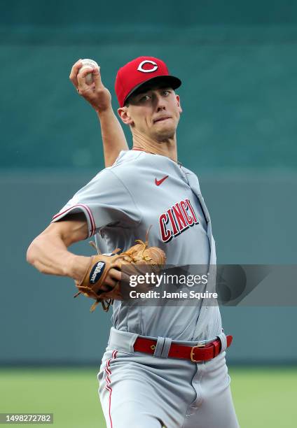 Starting pitcher Brandon Williamson of the Cincinnati Reds warms up prior to the game against the Kansas City Royals at Kauffman Stadium on June 13,...