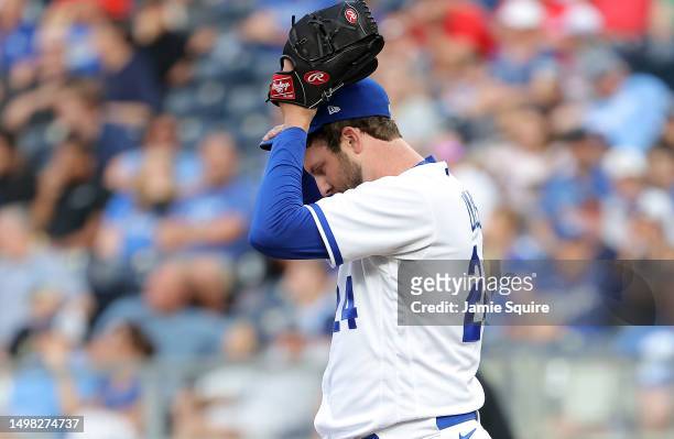 Starting pitcher Jordan Lyles of the Kansas City Royals reacts after giving up a run during the 2nd inning of the game against the Cincinnati Reds at...