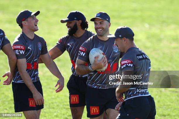 Mitchell Moses, Josh Addo-Carr, James Tedesco of the Blues share a laugh during a New South Wales Blues State of Origin training session at Coogee...