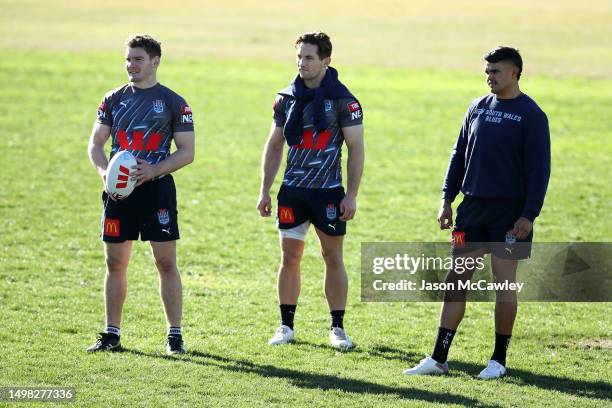 Liam Martin, Cameron Murray and Latrell Mitchell of the Blues look on during a New South Wales Blues State of Origin training session at Coogee Oval...