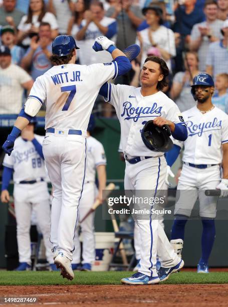 Bobby Witt Jr. #7 of the Kansas City Royals is congratulated by Nick Pratto after hitting a home run during the 3rd inning of the game against the...