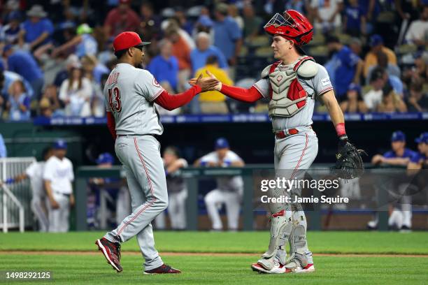 Alexis Diaz and Tyler Stephenson of the Cincinnati Reds congratulate each other after the Reds defeated the Kansas City Royals 5-4 to win the game at...