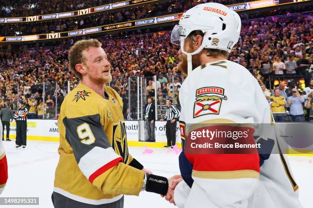 Jack Eichel of the Vegas Golden Knights shakes hands with Eric Staal of the Florida Panthers after a win in Game Five of the 2023 NHL Stanley Cup...