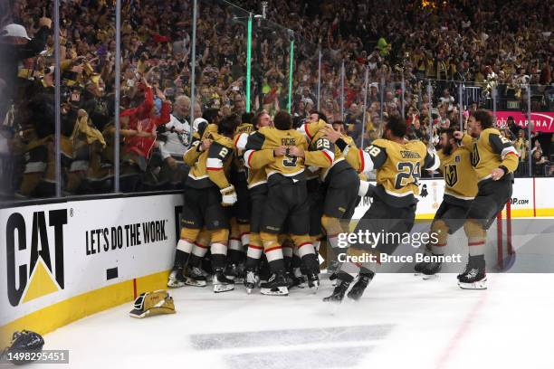 Members of the Vegas Golden Knights celebrate a championship win against the Florida Panthers in Game Five of the 2023 NHL Stanley Cup Final at...