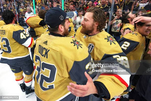 Jonathan Quick of the Vegas Golden Knights and Laurent Brossoit of the Vegas Golden Knights celebrate a championship win against the Florida Panthers...