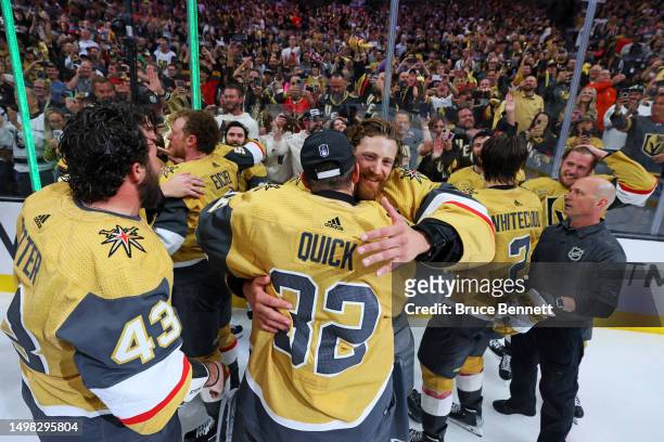 Jonathan Quick of the Vegas Golden Knights and Laurent Brossoit of the Vegas Golden Knights celebrate a championship win against the Florida Panthers...