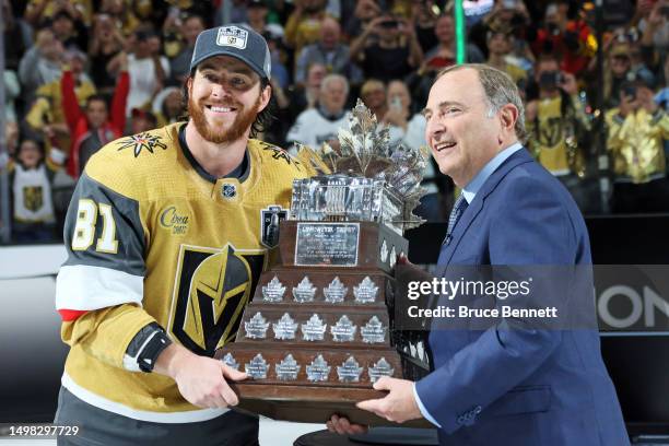 Commissioner Gary Bettman presents Jonathan Marchessault of the Vegas Golden Knights with the Conn Smythe trophy after the Vegas Golden Knights...