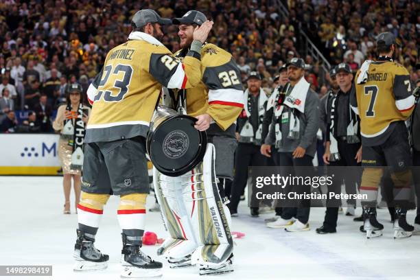 Alec Martinez of the Vegas Golden Knights and Jonathan Quick of the Vegas Golden Knights celebrate with the Stanley Cup after defeating the Florida...