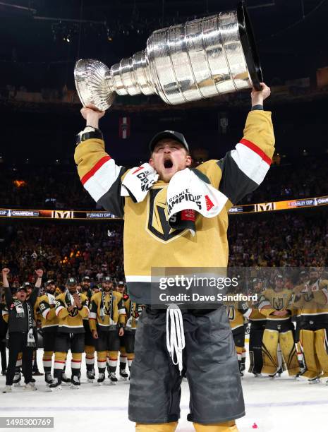 Jack Eichel of the Vegas Golden Knights hoists the Stanley Cup after Game Five of the 2023 NHL Stanley Cup Final between the Florida Panthers and the...