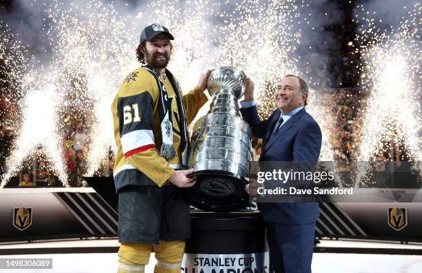 Commissioner Gary Bettman presents the Stanley Cup to captain Mark Stone of the Vegas Golden Knights after Game Five of the 2023 NHL Stanley Cup...