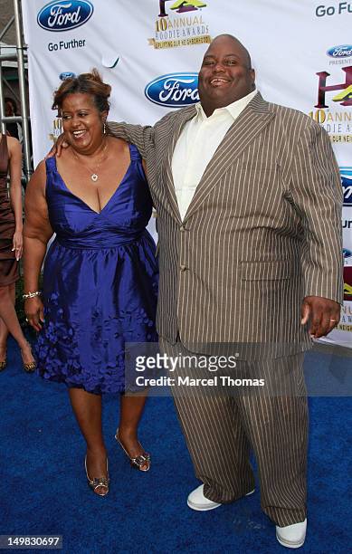 Comedian Lavell Crawford and mother Annita Crawford walk the blue carpet at the 10th Annual Ford Hoodie Awards at MGM Garden Arena on August 4, 2012...