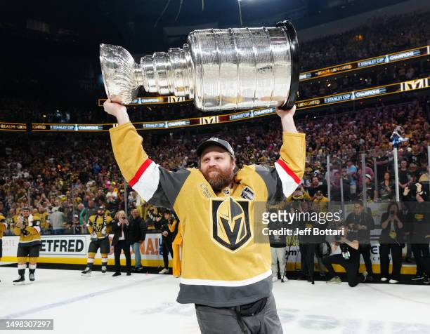 Phil Kessel of the Vegas Golden Knights celebrates with the Stanley Cup after a 9-3 victory against the Florida Panthers in Game Five of the 2023 NHL...