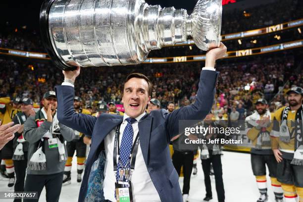 President George McPhee of the Vegas Golden Knights celebrates with the Stanley Cup after a 9-3 victory against the Florida Panthers in Game Five of...