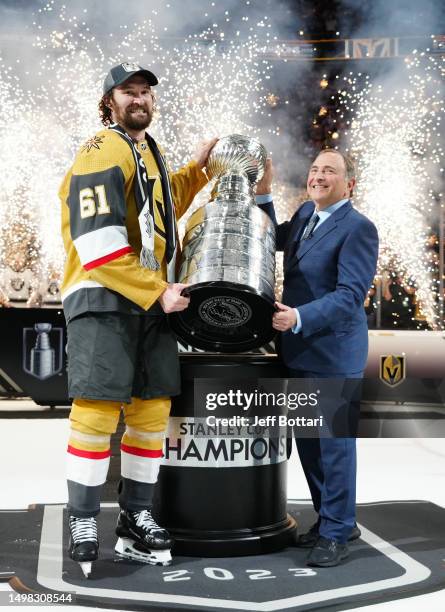 Commissioner Gary Bettman presents the Stanley Cup to captain Mark Stone of the Vegas Golden Knights after a 9-3 victory against the Florida Panthers...