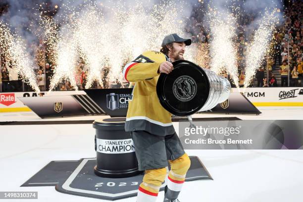 Mark Stone of the Vegas Golden Knights celebrates with the Stanley Cup after winning the championship against the Florida Panthers in Game Five of...