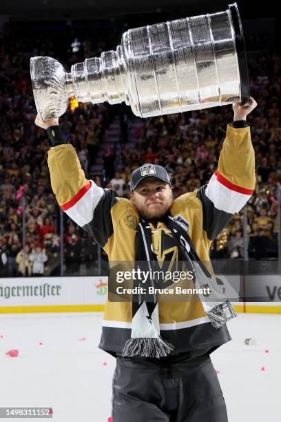 William Karlsson of the Vegas Golden Knights skates with the Stanley Cup following victory over the Florida Panthers in Game Five of the 2023 NHL...