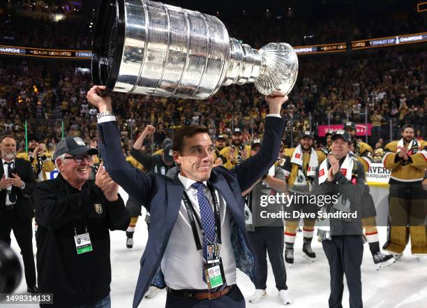 President of hockey operations George McPhee of the Vegas Golden Knights hoists the Stanley Cup after Game Five of the 2023 NHL Stanley Cup Final...